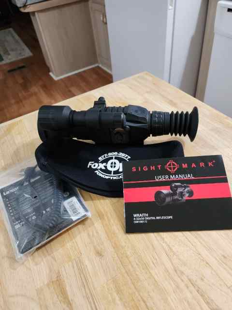 Sight Mark digital riflescope and more items.