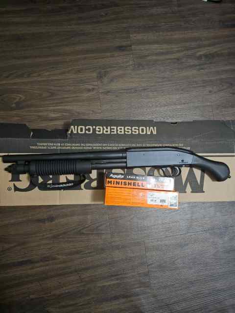 Mossberg shockwave 590 12 gauge with laser