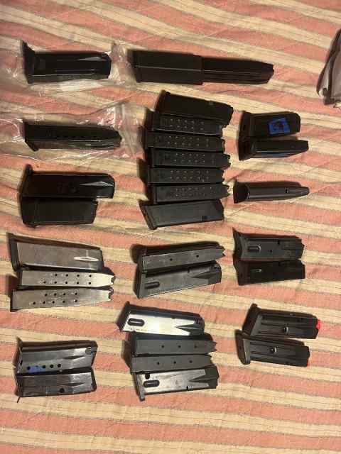 Lots of pistol mags, holsters, magpul grips etc