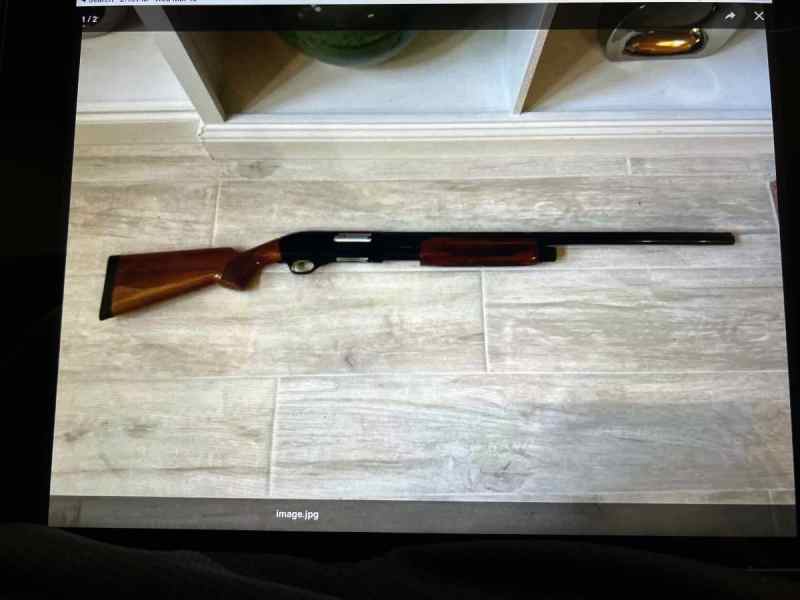Weatherby 12 gauge shotgun 