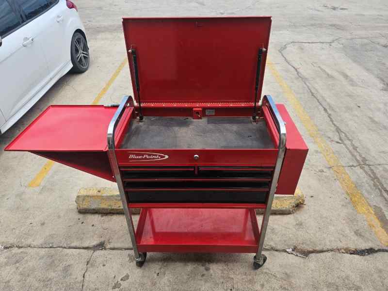 Blue point snap on rolling tool cart.