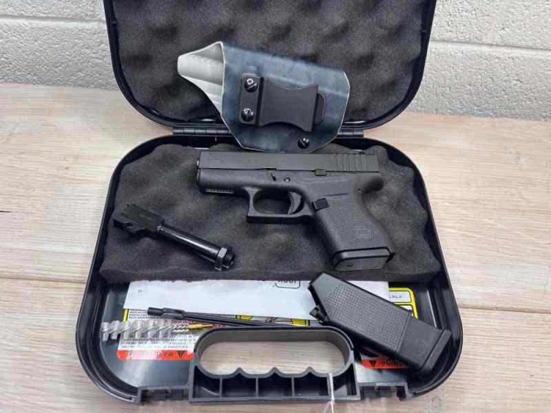Glock 43 9mm with threaded barrel and holster
