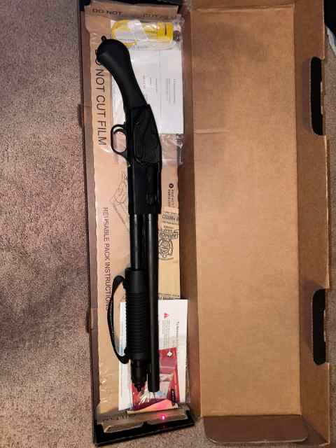 Mossberg 590 Shockwave W/ Trace Laser Saddle