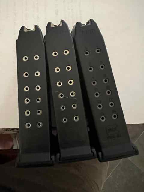 3 Glock 19 mags with extended baseplate. 15 rounds