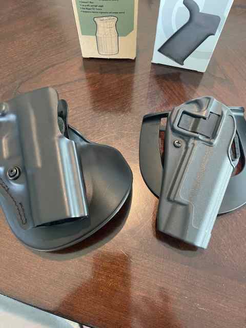 Two pistol holsters 