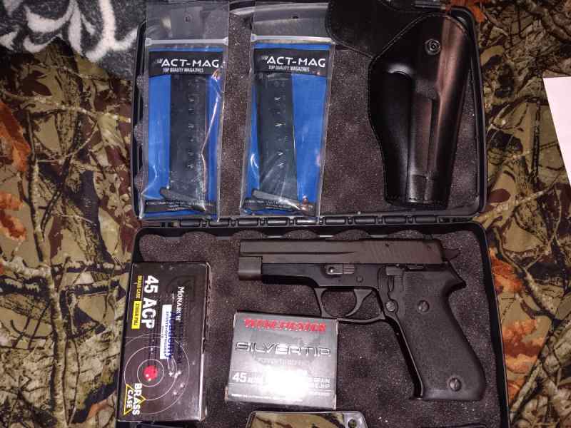 Sig P220 45ACP And Escort BullPup 12ga