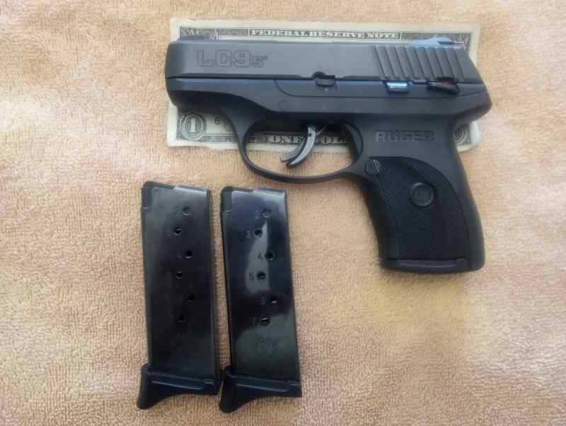 Ruger LC9s and three Ruger magazines 