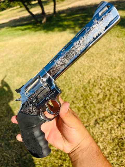 Engraved Taurus tracker revolver