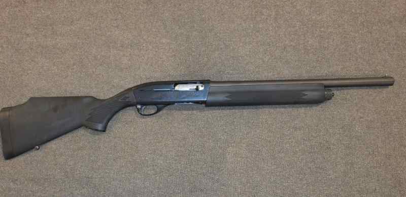 Remington 1100. 12 Gauge  Short Barrel 