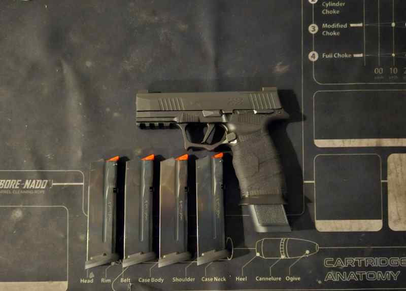 WTS P365XL Icarus grip, 21rd mag + 4 17rd