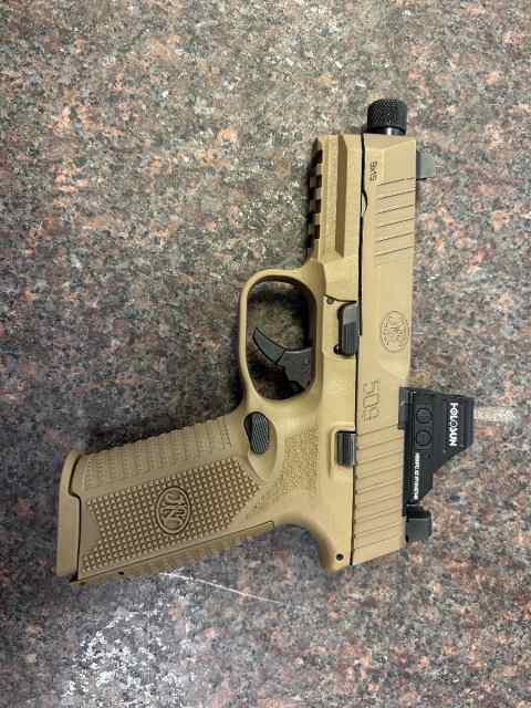 FN 509 tactical pistol w/holosun red dot 