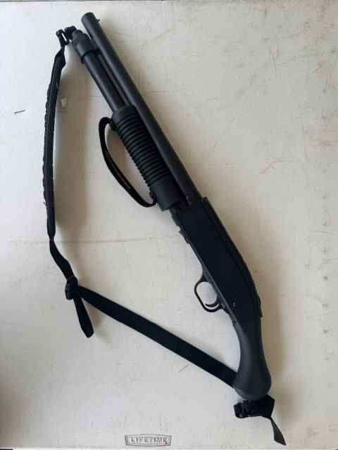 Mossberg 590 Shockwave with Crimson Trace Laser 