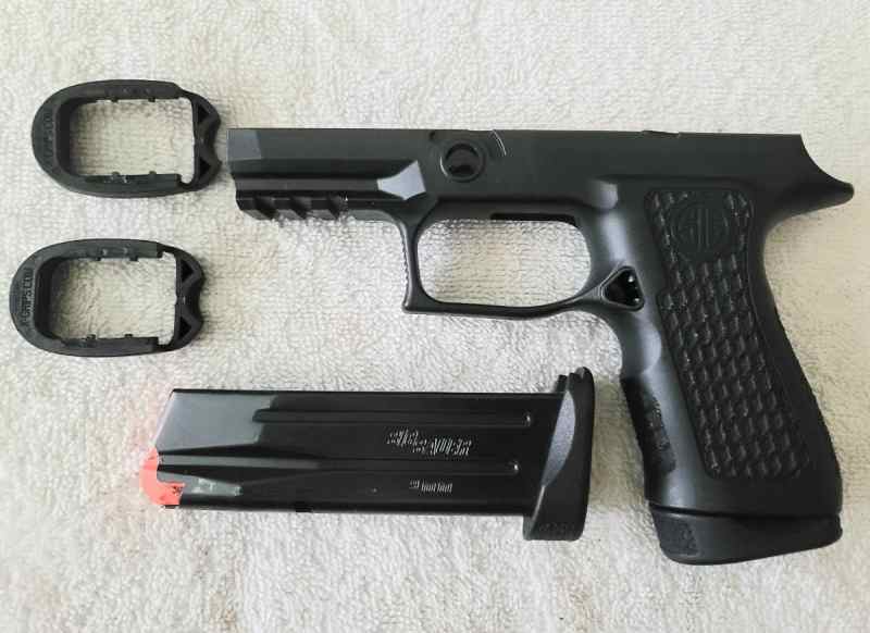 X-Compact Spectre grip w/ 15rnd Mags w/ Extensions