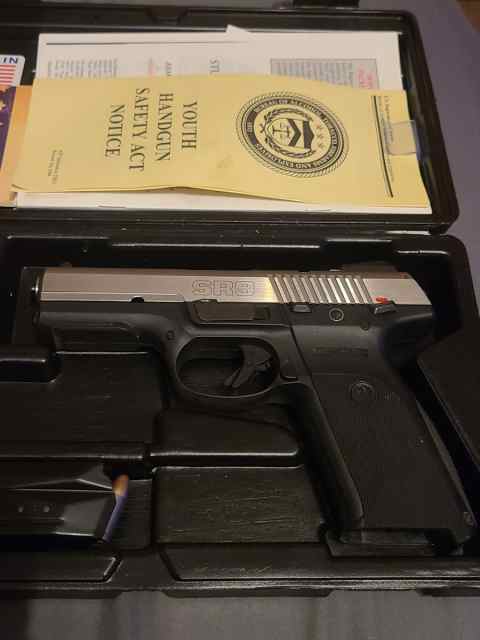 Ruger sr9 9mm, ruger case with extra mag $370