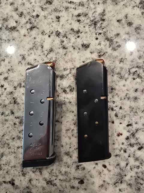 2 kimber 1911 mags loaded