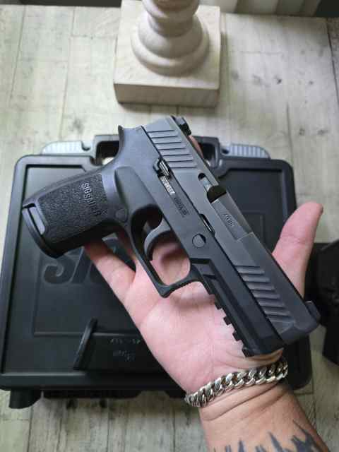 Trade sig 320 for 1911 or ar pistol 