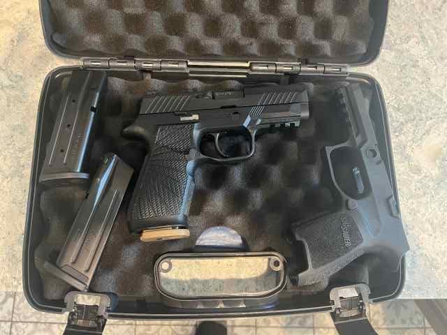 Sig P320 9mm with Wilson Combat lower extra mags