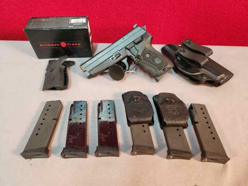 SIG SAUER P239 9MM CRIMSON TRACE GRIPS 7 MAGAZINES