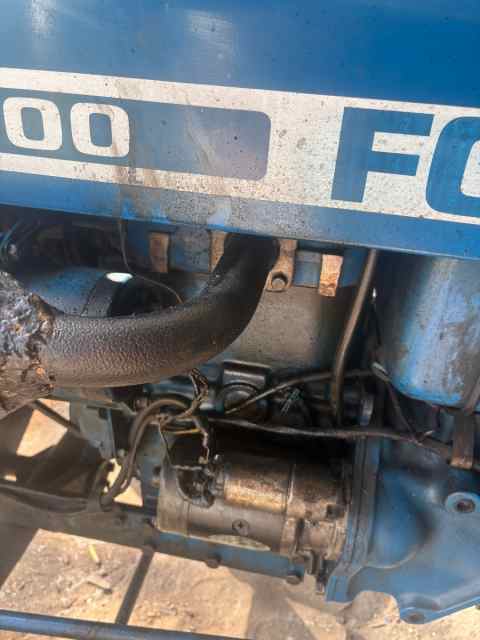 Ford 1500 tractor with bushhog. 