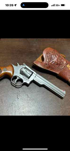 Dan Wesson 357 magnum with leather holster.