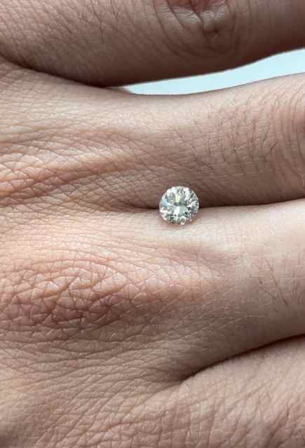 Natural Diamond, oval cut G color .58 carat VVS