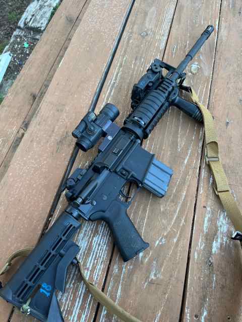 Colt M4 carbine with aimpoint and somo Peq15