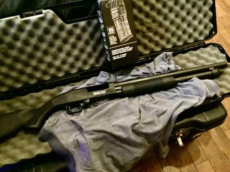 Mossberg 590M 12 ga . With 15 round magazine 