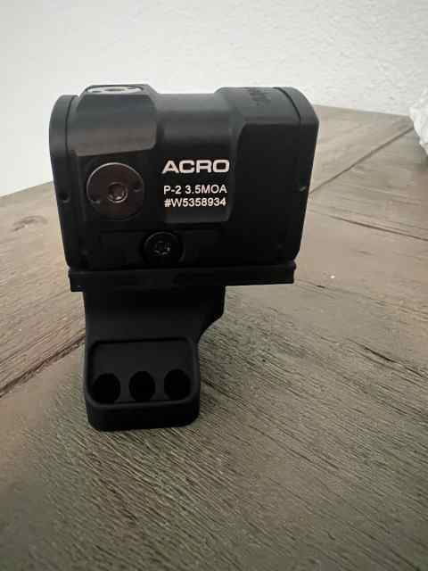 Aimpoint Acro P2. Never fired with.  $450