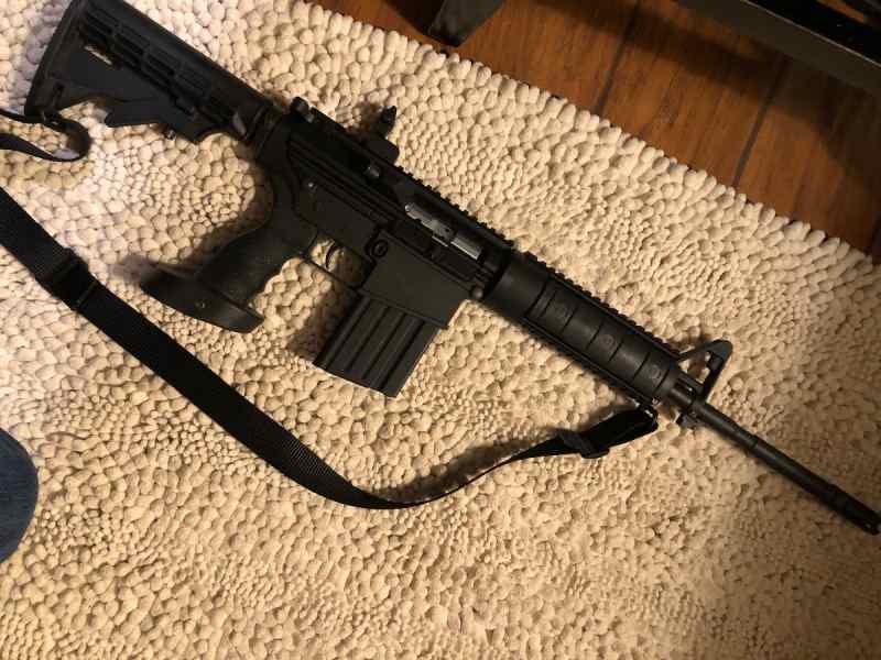 DPMS AR10 (comes with 5-20rd metal mags.)